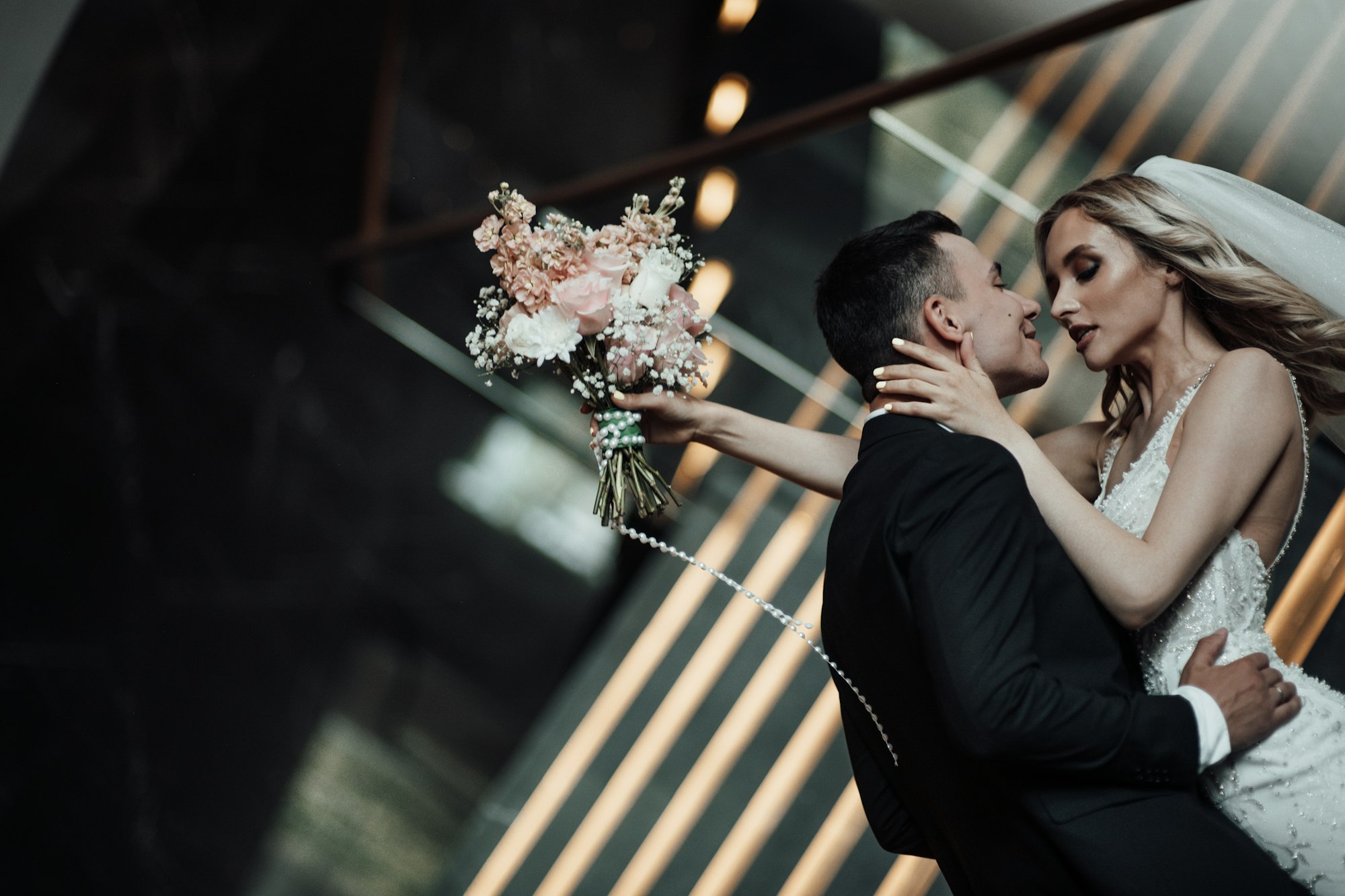 happy-authentic-candid-couple-in-love-indoor-at-luxury-hotel-date-in-wedding-apparel-2.jpg